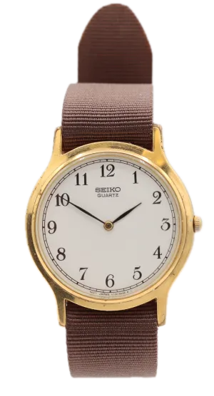 Vintage Seiko V700-8A10 Slim Dressy Men's Quartz Wristwatch Japan Gold Tone
